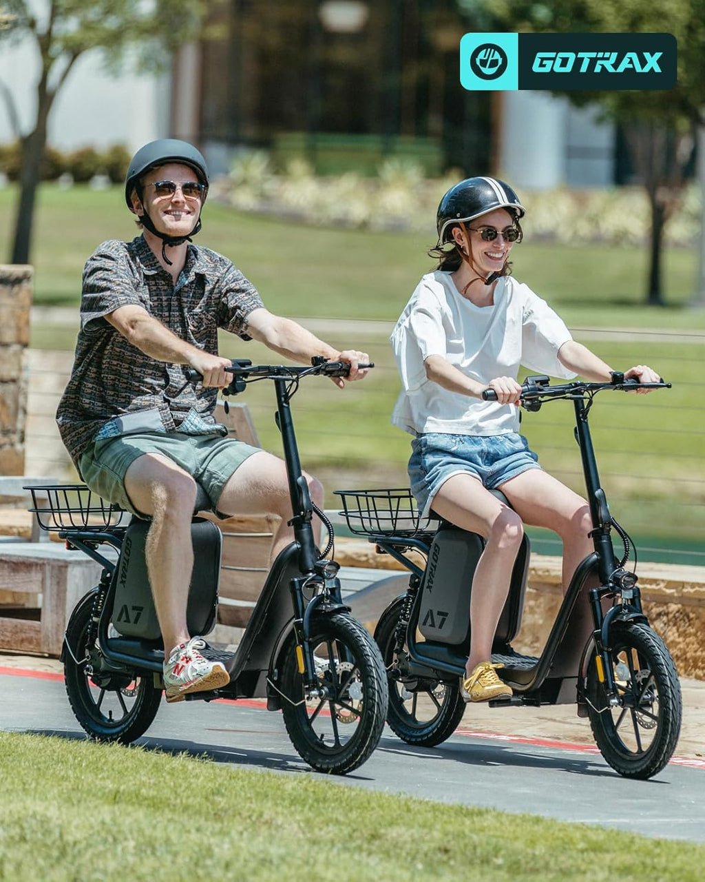 Gotrax adult electric scooter with seat, maximum range of 19-25 miles, all-terrain tires, wide pedals, padded seat, and carrycot wourant